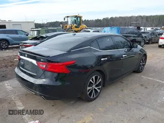 2018 Nissan Maxima SV with VIN 1N4AA6AP9JC383989, listed as a IAAI auction lot 41408474 with 195,135 mi miles and . Bid and sale history available at DreamBid. Image 4.