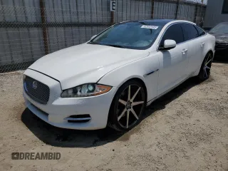 2013 Jaguar XJ with VIN SAJWA1C75D8V40541, listed as a Copart auction lot 62592345 with 70,159 mi miles and Salvage title. Bid and sale history available at DreamBid. Image 1.