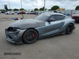 2022 Toyota Supra 3.0 с VIN WZ1DB0C09NW047931, выставлен на аукционе Copart как лот 59527955 с пробегом 61 941 миль миль и Списание • Salvage title. История ставок и продаж доступна на DreamBid. Изображение 1.