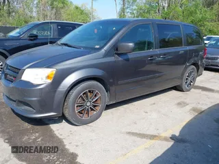 2016 Dodge Grand Caravan SE with VIN 2C4RDGBG9GR155175, listed as a IAAI auction lot 42086472 with 267,292 mi miles and . Bid and sale history available at DreamBid. Image 2.