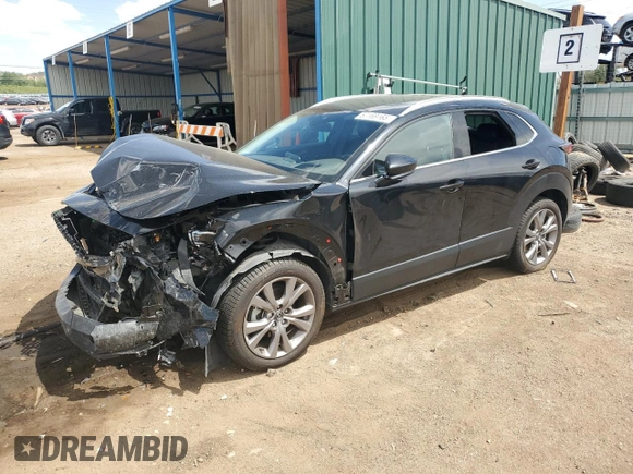 2023 Mazda CX-30 S Premium with VIN 3MVDMBDMXPM527113, listed as a Copart auction lot 57169165 with 49,040 mi miles and Salvage title. Bid and sale history available at DreamBid. Image 1.