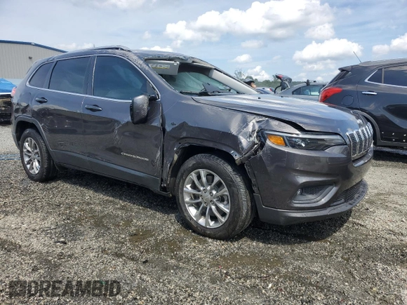 2019 Jeep Cherokee Latitude Plus with VIN 1C4PJLLN0KD119876, listed as a Copart auction lot 60462765 with 61,909 mi miles and Salvage title. Bid and sale history available at DreamBid. Image 4.