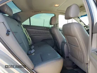 2004 Toyota Camry LE z VIN 4T1BE32K94U313343, wystawiony jako Copart lot #58053425 z przebiegiem 120 515 mil mil oraz Szkoda całkowita • Salvage title. Historia ofert i sprzedaży dostępna na DreamBid. Obrazek 10.
