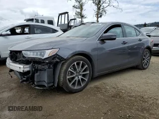 2018 Acura TLX with VIN 19UUB2F32JA010096, listed as a Copart auction lot 54727405 with 64,240 mi miles and Salvage Title. Bid and sale history available at carsss.com. Image 1.