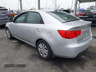 2013 Kia Forte LX with VIN KNAFT4A21D5739585, listed as a IAAI auction lot 42097213 with 195,500 mi miles. Bid and sale history available at carsss.com. Image 3.