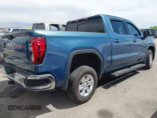 2024 GMC Sierra 1500 with VIN 1GTPHBEK1RZ191014, listed as a IAAI auction lot 41989521 with 8,277 mi miles and . Bid and sale history available at DreamBid. Image 4.