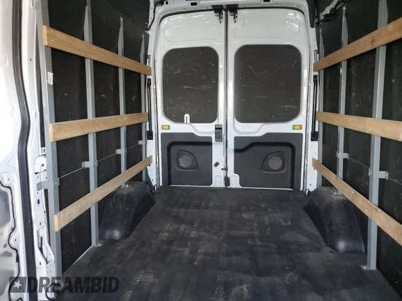 2021 Ford Transit Cargo with VIN 1FTBR1X88MKA24623, listed as a Copart auction lot 50757105 with 82,929 mi miles and Salvage Title. Bid and sale history available at DreamBid. Image 10.