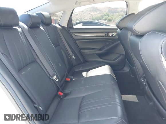 2021 Honda Accord Touring with VIN 1HGCV3F95MA000714, listed as a IAAI auction lot 42350127 with 69,731 mi miles and . Bid and sale history available at DreamBid. Image 8.