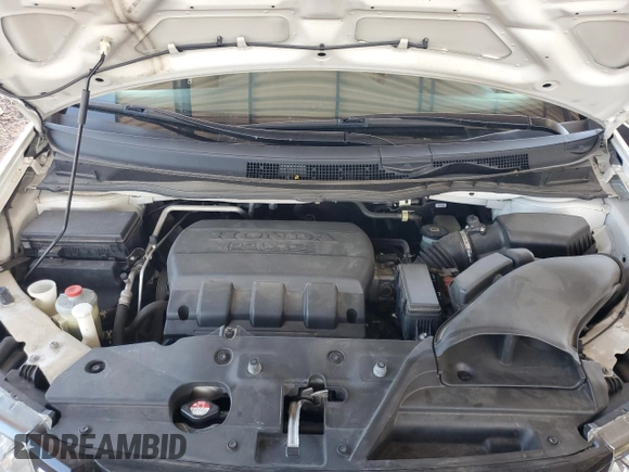 2014 Honda Odyssey Touring с VIN 5FNRL5H94EB110797, выставлен на аукционе Copart как лот 60702365 с пробегом 106 131 миль миль и Списание • Salvage title. История ставок и продаж доступна на DreamBid. Изображение 11.