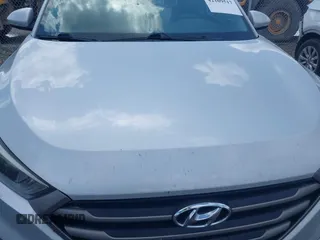 2016 Hyundai Tucson Sport with VIN KM8J33A25GU233478, listed as a IAAI auction lot 42109517 with 81,039 mi miles. Bid and sale history available at carsss.com. Image 6.