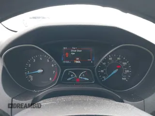 2016 Ford Focus SE with VIN 1FADP3F24GL337504, listed as a IAAI auction lot 41429358 with 91,458 mi miles and . Bid and sale history available at DreamBid. Image 7.