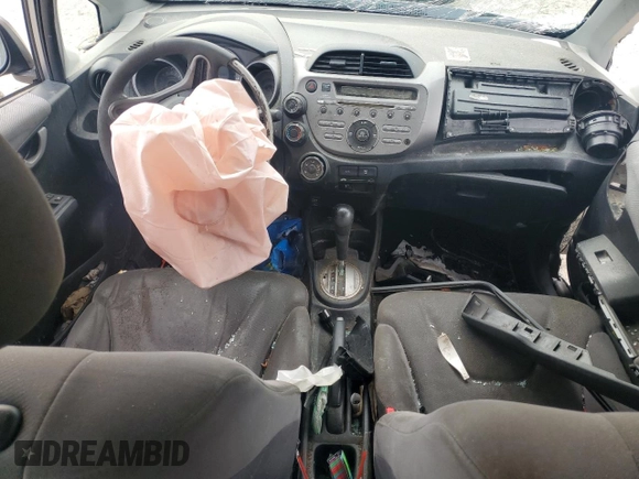 2009 Honda Fit with VIN JHMGE88249S025083, listed as a Copart auction lot 58121945 with Not provided miles and Salvage title. Bid and sale history available at DreamBid. Image 8.
