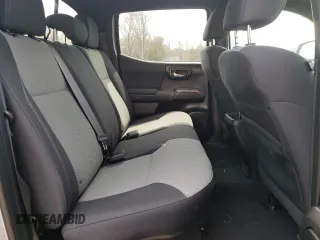 2021 Toyota Tacoma SR z VIN 5TFCZ5AN7MX272231, wystawiony jako Copart lot #52739255 z przebiegiem 67 414 mil mil oraz Szkoda całkowita • Salvage title. Historia ofert i sprzedaży dostępna na DreamBid. Obrazek 10.