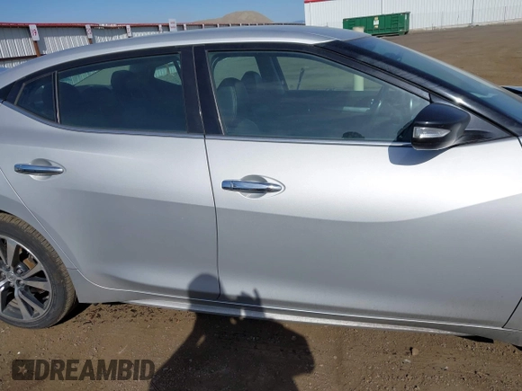 2018 Nissan Maxima S with VIN 1N4AA6AP1JC378429, listed as a IAAI auction lot 42138972 with 112,577 mi miles and . Bid and sale history available at DreamBid. Image 14.