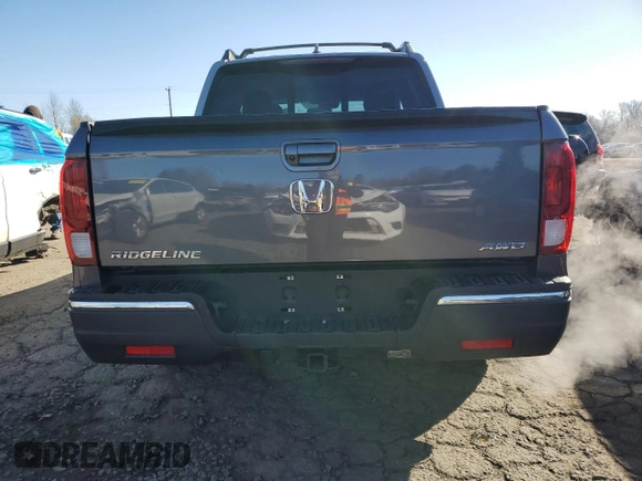 2020 Honda Ridgeline RTL with VIN 5FPYK3F5XLB031710, listed as a Copart auction lot 48028585 with 62,478 mi miles and Salvage title. Bid and sale history available at DreamBid. Image 6.