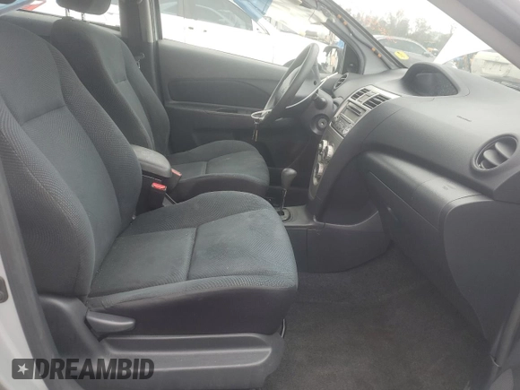 2012 Toyota Yaris with VIN JTDBT4K33CL010538, listed as a Copart auction lot 49124505 with 166,737 mi miles and Salvage Title. Bid and sale history available at DreamBid. Image 7.