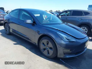 2023 Tesla Model 3 z VIN 5YJ3E1EAXPF710024, wystawiony jako IAAI lot #41228608 z przebiegiem 10 481 mil mil oraz . Historia ofert i sprzedaży dostępna na DreamBid. Obrazek 1.