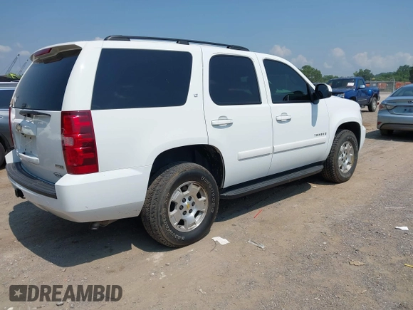 2008 Chevrolet Tahoe LTZ with VIN 1GNFK13008J156624, listed as a IAAI auction lot 42573117 with 185,116 mi miles and . Bid and sale history available at DreamBid. Image 4.