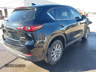 2023 Mazda CX-5 2.5 S with VIN JM3KFBAM9P0230299, listed as a IAAI auction lot 41656657 with 17,290 mi miles. Bid and sale history available at carsss.com. Image 4.