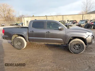 2016 Toyota Tacoma SR5 with VIN 5TFAX5GN1GX056450, listed as a IAAI auction lot 41215339 with 129,604 mi miles. Bid and sale history available at carsss.com. Image 14.