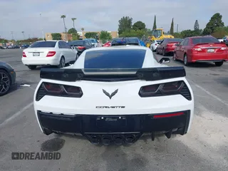 2014 Chevrolet Corvette 1LT z VIN 1G1YB2D72E5123317, wystawiony jako IAAI lot #42403964 z przebiegiem 36 113 mil mil oraz . Historia ofert i sprzedaży dostępna na DreamBid. Obrazek 16.