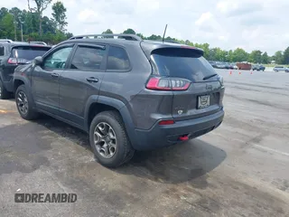 2020 Jeep Cherokee Trailhawk with VIN 1C4PJMBX5LD530720, listed as a IAAI auction lot 42404948 with 99,606 mi miles and . Bid and sale history available at DreamBid. Image 3.
