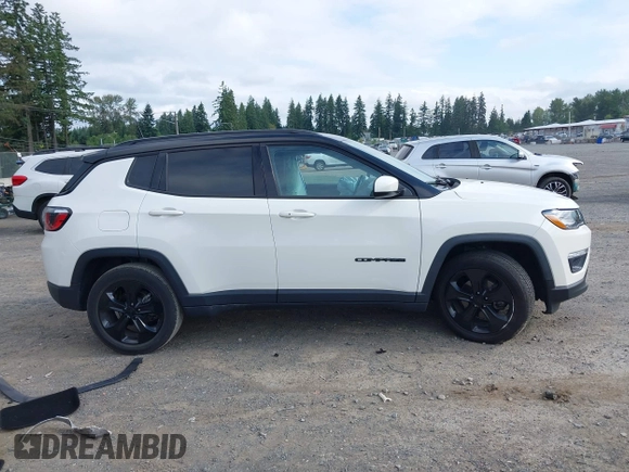 2019 Jeep Compass Latitude with VIN 3C4NJCBB0KT677025, listed as a IAAI auction lot 42574952 with 53,681 mi miles and . Bid and sale history available at DreamBid. Image 13.