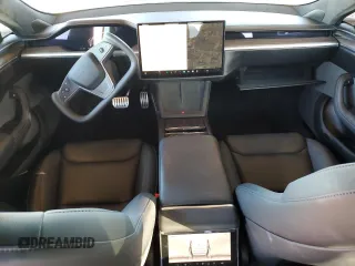 2022 Tesla Model S with VIN 5YJSA1E51NF464763, listed as a Copart auction lot 43559465 with 36,079 mi miles and Salvage title. Bid and sale history available at DreamBid. Image 8.