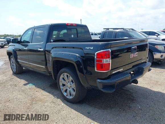 2015 GMC Sierra 1500 Denali z VIN 3GTU2WEJ9FG386812, wystawiony jako IAAI lot #42381651 z przebiegiem 138 009 mil mil oraz . Historia ofert i sprzedaży dostępna na DreamBid. Obrazek 3.
