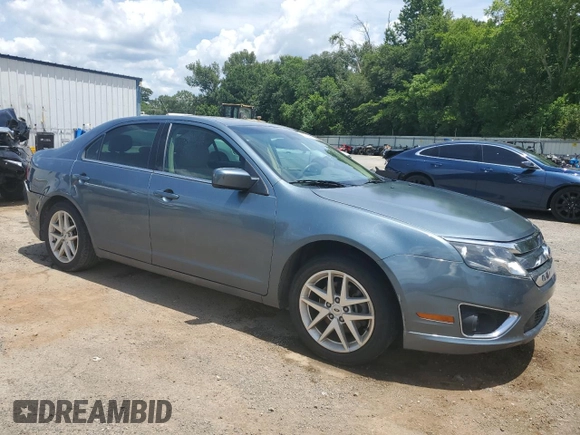 2012 Ford Fusion SEL with VIN 3FAHP0JG0CR222865, listed as a Copart auction lot 62716515 with 99,009 mi miles and Salvage title. Bid and sale history available at DreamBid. Image 4.