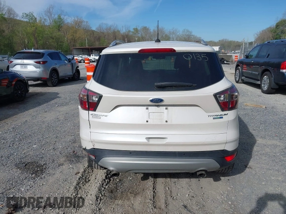 2017 Ford Escape Titanium with VIN 1FMCU9JD9HUB40135, listed as a IAAI auction lot 42054533 with 68,255 mi miles. Bid and sale history available at carsss.com. Image 16.
