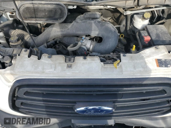2019 Ford Transit with VIN 1FTYE1CMXKKB76439, listed as a Copart auction lot 43841795 with 232,061 mi miles and Salvage Title. Bid and sale history available at DreamBid. Image 12.