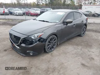 2014 Mazda 3 S Grand Touring with VIN JM1BM1W39E1145186, listed as a IAAI auction lot 41948404 with 111,702 mi miles and . Bid and sale history available at DreamBid. Image 17.