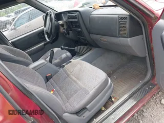 1998 Jeep Cherokee Sport with VIN 1J4FJ68S0WL117837, listed as a IAAI auction lot 42125538 with 1 mi miles. Bid and sale history available at carsss.com. Image 5.