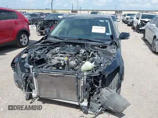 2014 Infiniti Q50 Premium z VIN JN1BV7AP2EM673289, wystawiony jako IAAI lot #42552398 z przebiegiem 172 770 mil mil oraz . Historia ofert i sprzedaży dostępna na DreamBid. Obrazek 6.