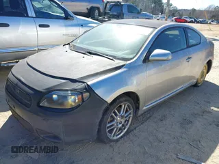 2005 Scion tC with VIN JTKDE177250062379, listed as a IAAI auction lot 41597376 with 220,110 mi miles. Bid and sale history available at carsss.com. Image 2.