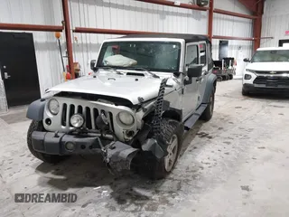 2008 Jeep Wrangler Unlimited X with VIN 1J4GA391X8L647311, listed as a IAAI auction lot 41499620 with 140,601 mi miles and . Bid and sale history available at carsss.com. Image 2.