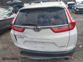 2019 Honda CR-V Touring with VIN 2HKRW1H90KH505234, listed as a IAAI auction lot 41152731 with 107,293 mi miles. Bid and sale history available at carsss.com. Image 16.