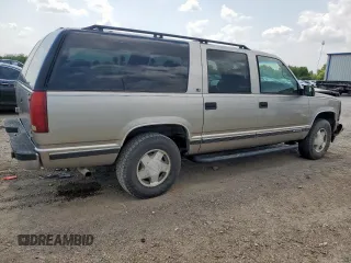 1999 Chevrolet Suburban z VIN 3GNFK16R2XG191868, wystawiony jako Copart lot #57620165 z przebiegiem 128 526 mil mil oraz Szkoda całkowita • Salvage title. Historia ofert i sprzedaży dostępna na DreamBid. Obrazek 3.