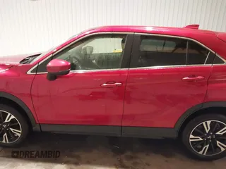 2024 Mitsubishi Eclipse Cross SE z VIN JA4ATWAAXRZ037663, wystawiony jako IAAI lot #41315137 z przebiegiem 23 678 mil mil oraz . Historia ofert i sprzedaży dostępna na DreamBid. Obrazek 15.