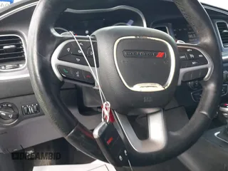 2015 Dodge Charger SXT with VIN 2C3CDXHG4FH884058, listed as a IAAI auction lot 41724894 with 202,701 mi miles and . Bid and sale history available at DreamBid. Image 11.