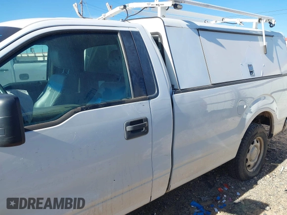2012 Ford F-150 XL with VIN 1FTMF1CM9CKD33309, listed as a IAAI auction lot 41427178 with 125,029 mi miles. Bid and sale history available at carsss.com. Image 13.