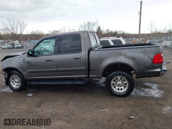 2003 Ford F-150 XLT with VIN 1FTRW086X3KA54557, listed as a IAAI auction lot 41888037 with 217,512 mi miles. Bid and sale history available at carsss.com. Image 14.