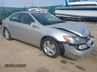 2005 Acura RL z VIN JH4KB16545C019697, wystawiony jako IAAI lot #41880820 z przebiegiem Nie podano mil oraz . Historia ofert i sprzedaży dostępna na DreamBid. Obrazek 1.