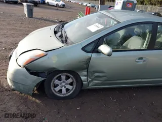 2007 Toyota Prius with VIN JTDKB20U977662792, listed as a IAAI auction lot 41589683 with 117,708 mi miles. Bid and sale history available at carsss.com. Image 6.