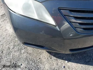 2007 Toyota Camry CE with VIN 4T1BE46K77U714426, listed as a IAAI auction lot 41815743 with 343,307 mi miles. Bid and sale history available at carsss.com. Image 6.