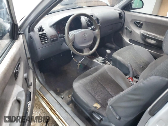 2002 Hyundai Accent with VIN KMHCF35G82U192732, listed as a Copart auction lot 85187074 with 224,194 mi miles and Clean title. Bid and sale history available at DreamBid. Image 8.