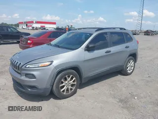 2015 Jeep Cherokee Sport z VIN 1C4PJLABXFW684235, wystawiony jako IAAI lot #42788242 z przebiegiem 260 453 mil mil oraz . Historia ofert i sprzedaży dostępna na DreamBid. Obrazek 2.
