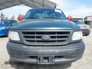 2003 Ford F-150 XL with VIN 1FTRX17263NB88093, listed as a IAAI auction lot 41772955 with 1 mi miles. Bid and sale history available at carsss.com. Image 12.