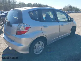 2013 Honda Fit with VIN JHMGE8H35DC073946, listed as a IAAI auction lot 41834130 with 173,018 mi miles. Bid and sale history available at carsss.com. Image 4.